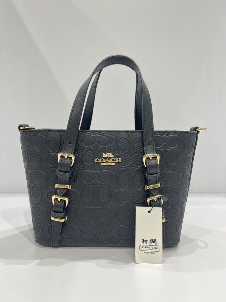 شنطة COACH